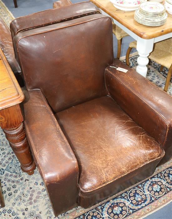 A pair of club armchairs